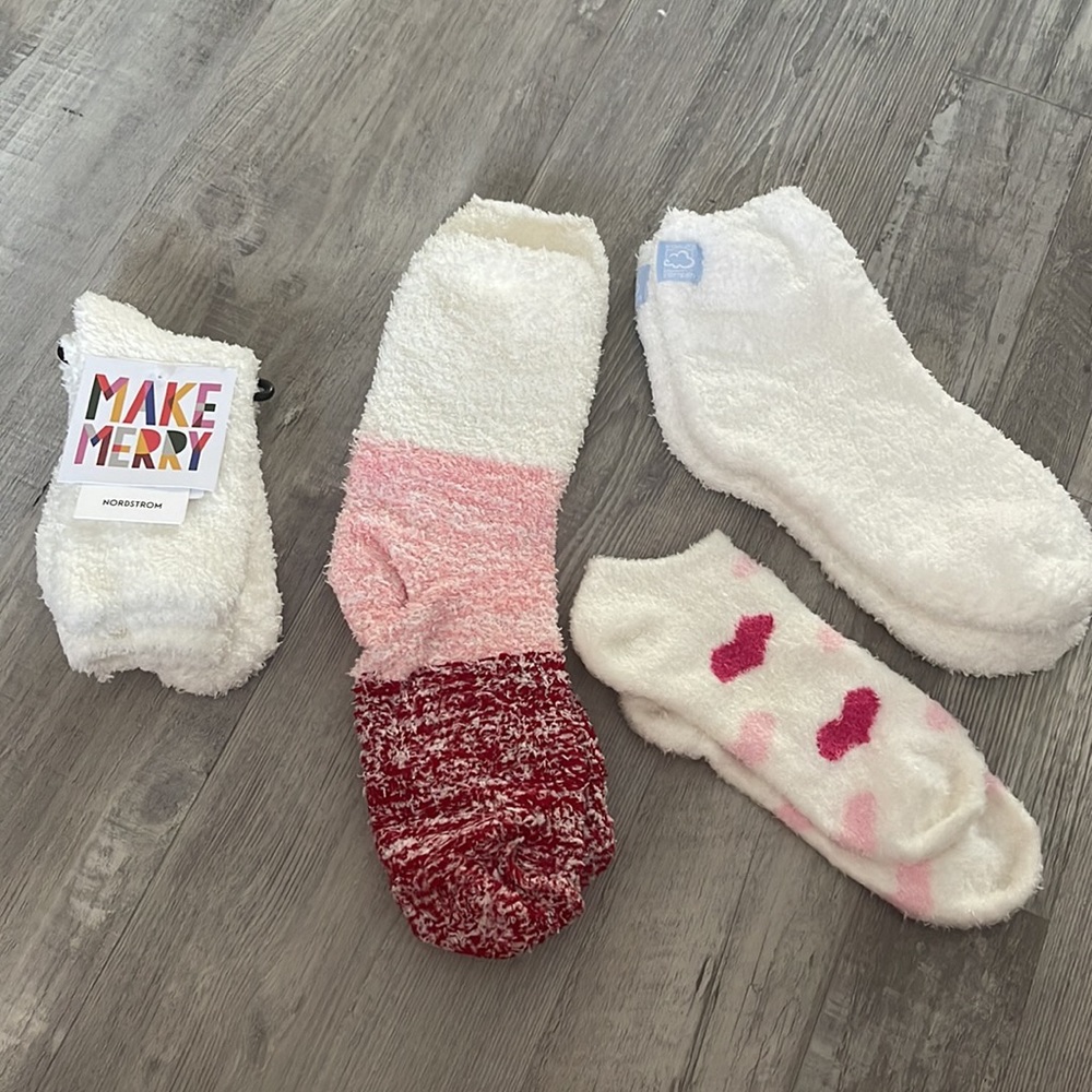 Set of four white and pink fuzzy socks